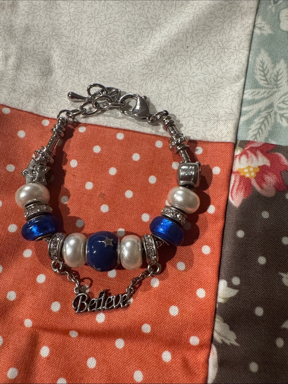 Source Unknown Silver Bracelet with Blue and White Beads - 'Believe' Charm
